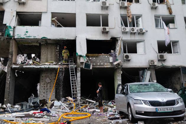 RECORD DATE NOT STATED A vehicle stands outside an apartment building damaged in a massive combined Russian attack on Kyiv, Ukraine, on July 6, 2026. Russian forces launched a large-scale attack on the capital using ballistic and cruise missiles as well as attack drones, causing destruction to residential buildings and civilian infrastructure in several districts of the city. The Podilskyi district was hit hardest. At least 11 people were killed and 46 others were injured (Photo by Kyrylo Chubotin Ukrinform) Russia launches another massive strike on Kyiv  Copyright: xKyryloxChubotinx