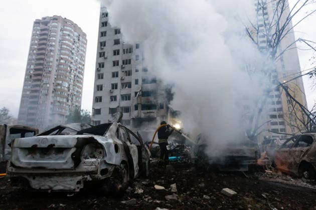 RECORD DATE NOT STATED A firefighter extinguishes a fire in a vehicle destroyed during a massive combined Russian attack on Kyiv, Ukraine, on July 6, 2026. Russian forces launched a large-scale attack on the capital using ballistic and cruise missiles as well as attack drones, causing destruction to residential buildings and civilian infrastructure in several districts of the city. The Podilskyi district was hit hardest. At least 11 people were killed and 46 others were injured (Photo by Kyrylo Chubotin Ukrinform) Russia launches another massive strike on Kyiv  Copyright: xKyryloxChubotinx