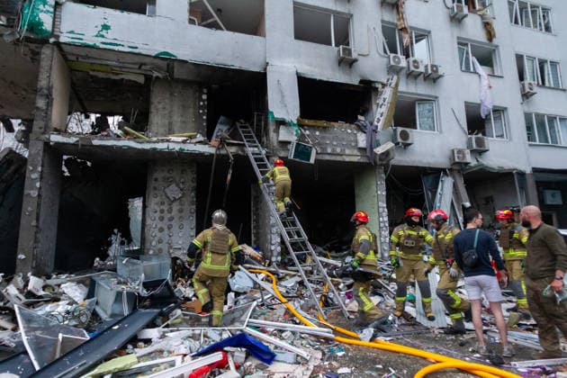 RECORD DATE NOT STATED Rescuers work at the site of a residential apartment building damaged in a massive combined Russian attack on Kyiv, Ukraine, on July 6, 2026. Russian forces launched a large-scale attack on the capital using ballistic and cruise missiles as well as attack drones, causing destruction to residential buildings and civilian infrastructure in several districts of the city. The Podilskyi district was hit hardest. At least 11 people were killed and 46 others were injured (Photo by Kyrylo Chubotin Ukrinform) Russia launches another massive strike on Kyiv  Copyright: xKyryloxChubotinx