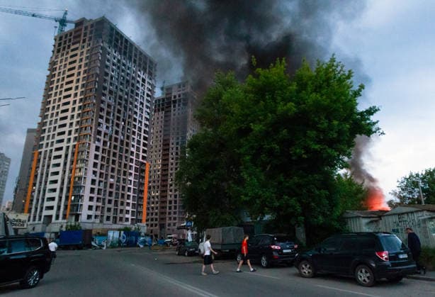 RECORD DATE NOT STATED Black smoke rises above a building following a massive combined Russian attack in Kyiv, Ukraine, on July 6, 2026. Russian forces launched a large-scale attack on the capital using ballistic and cruise missiles, as well as attack drones, causing extensive damage to residential buildings and civilian infrastructure in several districts of the city. The Podilskyi district was hit the hardest. At least 11 people were killed and 46 others were injured (Photo by Kyrylo Chubotin Ukrinform) Russia launches another massive strike on Kyiv  Copyright: xKyryloxChubotinx