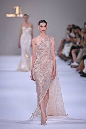 PFW - Tamara Ralph Runway in Paris FA A model walks the runway the Autumn-Winter 2027 2028 couture collection by Tamara Ralph during the Paris Fashion Week, on July 6, 2026. Photo by Firas Abdullah ABACAPRESS.COM Paris Ile-de-France France  Copyright: xAbdullahxFiras ABACAx