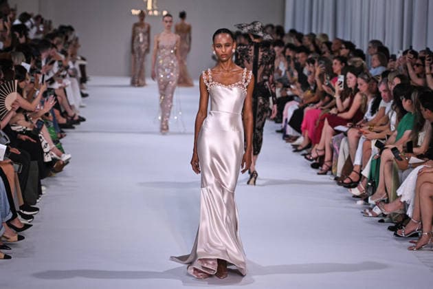 PFW - Tamara Ralph Runway in Paris FA A model walks the runway the Autumn-Winter 2027 2028 couture collection by Tamara Ralph during the Paris Fashion Week, on July 6, 2026. Photo by Firas Abdullah ABACAPRESS.COM Paris Ile-de-France France  Copyright: xAbdullahxFiras ABACAx