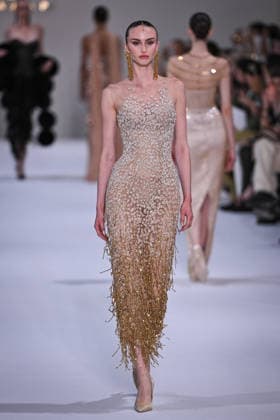 PFW - Tamara Ralph Runway in Paris FA A model walks the runway the Autumn-Winter 2027 2028 couture collection by Tamara Ralph during the Paris Fashion Week, on July 6, 2026. Photo by Firas Abdullah ABACAPRESS.COM Paris Ile-de-France France  Copyright: xAbdullahxFiras ABACAx