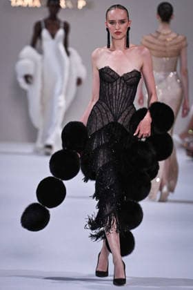 PFW - Tamara Ralph Runway in Paris FA A model walks the runway the Autumn-Winter 2027 2028 couture collection by Tamara Ralph during the Paris Fashion Week, on July 6, 2026. Photo by Firas Abdullah ABACAPRESS.COM Paris Ile-de-France France  Copyright: xAbdullahxFiras ABACAx
