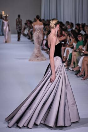 PFW - Tamara Ralph Runway in Paris FA A model walks the runway the Autumn-Winter 2027 2028 couture collection by Tamara Ralph during the Paris Fashion Week, on July 6, 2026. Photo by Firas Abdullah ABACAPRESS.COM Paris Ile-de-France France  Copyright: xAbdullahxFiras ABACAx