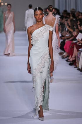 PFW - Tamara Ralph Runway in Paris FA A model walks the runway the Autumn-Winter 2027 2028 couture collection by Tamara Ralph during the Paris Fashion Week, on July 6, 2026. Photo by Firas Abdullah ABACAPRESS.COM Paris Ile-de-France France  Copyright: xAbdullahxFiras ABACAx