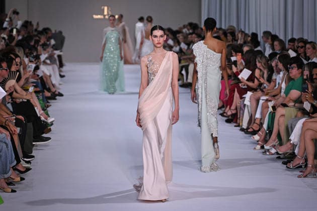 PFW - Tamara Ralph Runway in Paris FA A model walks the runway the Autumn-Winter 2027 2028 couture collection by Tamara Ralph during the Paris Fashion Week, on July 6, 2026. Photo by Firas Abdullah ABACAPRESS.COM Paris Ile-de-France France  Copyright: xAbdullahxFiras ABACAx