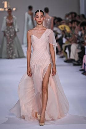 PFW - Tamara Ralph Runway in Paris FA A model walks the runway the Autumn-Winter 2027 2028 couture collection by Tamara Ralph during the Paris Fashion Week, on July 6, 2026. Photo by Firas Abdullah ABACAPRESS.COM Paris Ile-de-France France  Copyright: xAbdullahxFiras ABACAx