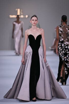 PFW - Tamara Ralph Runway in Paris FA A model walks the runway the Autumn-Winter 2027 2028 couture collection by Tamara Ralph during the Paris Fashion Week, on July 6, 2026. Photo by Firas Abdullah ABACAPRESS.COM Paris Ile-de-France France  Copyright: xAbdullahxFiras ABACAx