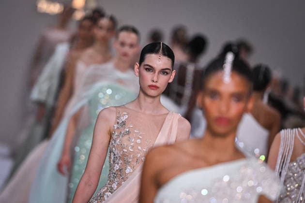 PFW - Tamara Ralph Runway in Paris FA A model walks the runway the Autumn-Winter 2027 2028 couture collection by Tamara Ralph during the Paris Fashion Week, on July 6, 2026. Photo by Firas Abdullah ABACAPRESS.COM Paris Ile-de-France France  Copyright: xAbdullahxFiras ABACAx