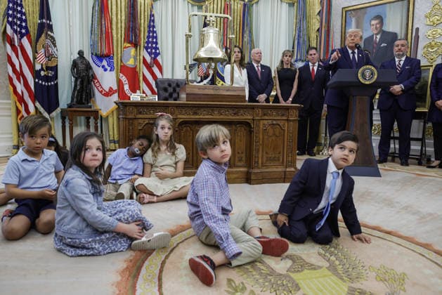 Children sit on the floor as US President Donald J. Trump (R) speaks on the first day of trading for Trump Accounts in the Oval Office of the White House in Washington, DC, USA, 06 July 2026. Trump Accounts grant eligible US children born between 2026 and 2028 $1000.00 to fund ‘starter’ IRAs. Copyright: xShawnxThewx xPoolxviaxCNPx MediaPunchx