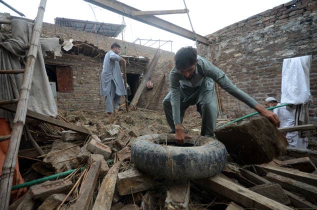 July 6, 2026, Peshawar, Peshawar, Pakistan: Severe Storm and Heavy Rain Lash Peshawar, Leaving Widespread Damage and Multiple Injuries..Peshawar, Pakistan, July, 06: Torrential rain and a powerful windstorm caused widespread destruction across Peshawar, uprooting trees, damaging homes, and flooding major roads. In one incident, the collapse of a house roof left four women and several children seriously injured. Streets in several areas were submerged, resembling ponds and disrupting daily life as rescue and emergency teams responded to the affected locations. Peshawar Pakistan - ZUMAa217 20260706_znp_a217_019 Copyright: xHussainxAlix