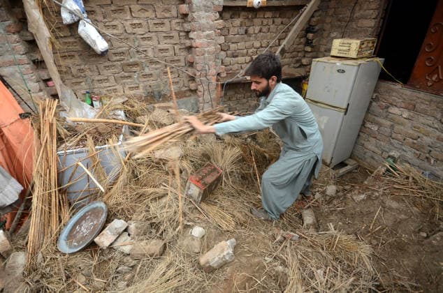 July 6, 2026, Peshawar, Peshawar, Pakistan: Severe Storm and Heavy Rain Lash Peshawar, Leaving Widespread Damage and Multiple Injuries..Peshawar, Pakistan, July, 06: Torrential rain and a powerful windstorm caused widespread destruction across Peshawar, uprooting trees, damaging homes, and flooding major roads. In one incident, the collapse of a house roof left four women and several children seriously injured. Streets in several areas were submerged, resembling ponds and disrupting daily life as rescue and emergency teams responded to the affected locations. Peshawar Pakistan  - ZUMAa217 20260706_znp_a217_029 Copyright: xHussainxAlix
