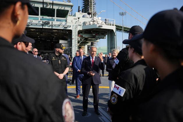 July 6, 2026, Halifax, Ns, Canada: Prime Minister Mark Carney, centre, and Industry Minister Melanie Joly greet sailors following an announcement at HMC Dockyard in Halifax on Monday, July 6, 2026. Halifax Canada  - ZUMAc35_ 20260706_zaf_c35_077 Copyright: xDarrenxCalabresex