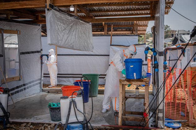 (260706) -- BUNIA, July 6, 2026 -- Medical workers carry out disinfection work at an Ebola treatment center in Bunia, the capital of Ituri Province in the Democratic Republic of the Congo, July 6, 2026. The death toll from the latest Ebola outbreak in the Democratic Republic of the Congo has surpassed 500, according to a report released Sunday by the country s health authorities. DR CONGO-BUNIA-EBOLA OUTBREAK-DEATH XinxHuashefa 