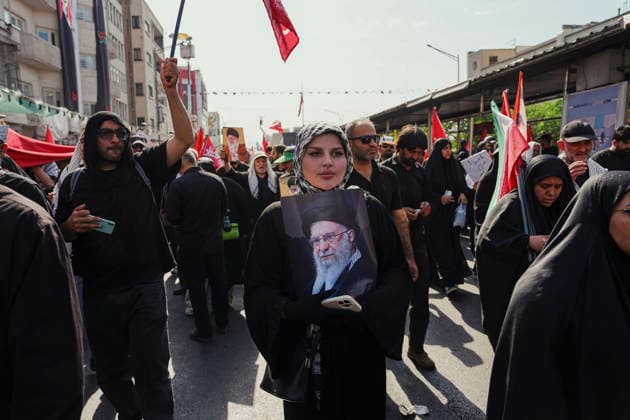 Tehran Funeral Procession For Khamenei A mourner holds a portrait of Iran s slain supreme leader Ayatollah Ali Khamenei as people attend the funeral procession of him and his family members in Tehran on July 6, 2026. Vast crowds gathered for the funeral procession of Iran s slain supreme leader Ali Khamenei in Tehran on July 6, with authorities estimating millions were on the streets in numbers that could rival those of his predecessor s farewell nearly four decades ago. Tehran Tehran Iran Copyright: xArezoox