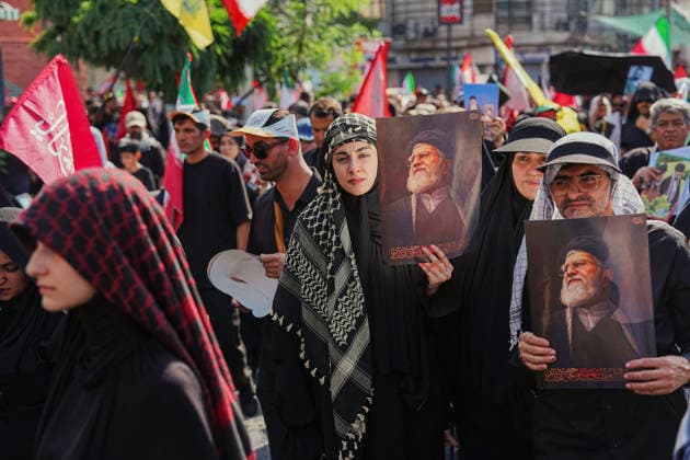 Tehran Funeral Procession For Khamenei A mourner holds a portrait of Iran s slain supreme leader Ayatollah Ali Khamenei as people attend the funeral procession of him and his family members in Tehran on July 6, 2026. Vast crowds gathered for the funeral procession of Iran s slain supreme leader Ali Khamenei in Tehran on July 6, with authorities estimating millions were on the streets in numbers that could rival those of his predecessor s farewell nearly four decades ago. Tehran Tehran Iran Copyright: xArezoox