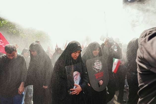 Tehran Funeral Procession For Khamenei A mourner holds a portrait of Iran s slain supreme leader Ayatollah Ali Khamenei as people attend the funeral procession of him and his family members in Tehran on July 6, 2026. Vast crowds gathered for the funeral procession of Iran s slain supreme leader Ali Khamenei in Tehran on July 6, with authorities estimating millions were on the streets in numbers that could rival those of his predecessor s farewell nearly four decades ago. Tehran Tehran Iran Copyright: xArezoox