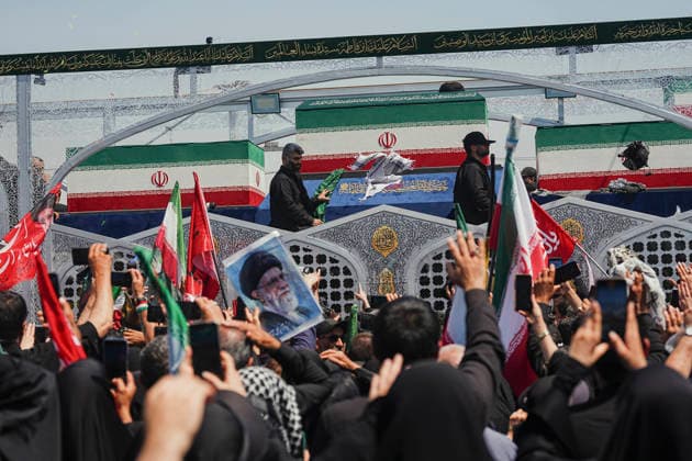 Tehran Funeral Procession For Khamenei Crowds of mourners surround the convoy carrying the coffins of Iran s slain supreme leader Ali Khamenei and members of his family during a funeral procession near Azadi Square in Tehran on July 6, 2026. Vast crowds gathered for the funeral procession of Iran s slain supreme leader Ali Khamenei in Tehran on July 6, with authorities estimating millions were on the streets in numbers that could rival those of his predecessor s farewell nearly four decades ago. Tehran Tehran Iran Copyright: xArezoox