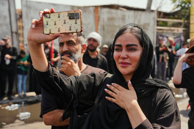 Tehran Funeral Procession For Khamenei A woman takes part in the funeral procession of Iran s slain supreme leader Ali Khamenei and his family members in Tehran, Iran, July 6, 2026. Vast crowds gathered for the funeral procession of Iran s slain supreme leader Ali Khamenei in Tehran on July 6, with authorities estimating millions were on the streets in numbers that could rival those of his predecessor s farewell nearly four decades ago. Tehran Tehran Iran Copyright: xArezoox
