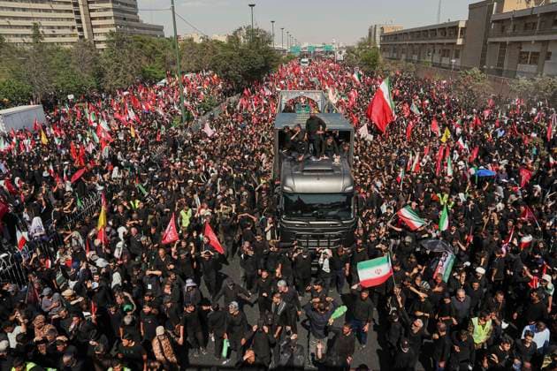 Tehran Funeral Procession For Khamenei Crowds of mourners surround the convoy carrying the coffins of Iran s slain supreme leader Ali Khamenei and members of his family during a funeral procession near Azadi Square in Tehran on July 6, 2026. Vast crowds gathered for the funeral procession of Iran s slain supreme leader Ali Khamenei in Tehran on July 6, with authorities estimating millions were on the streets in numbers that could rival those of his predecessor s farewell nearly four decades ago. Tehran Tehran Iran Copyright: xArezoox