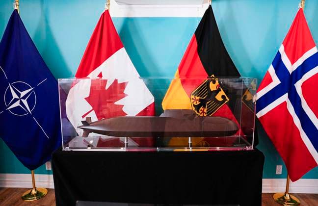 July 6, 2026, Ottawa, On, CAN: The flags of North Atlantic Treaty Organization (NATO), left, Canada, Germany and Norway are seen behind a model of a Type 212CD submarine at the Embassy of Germany in Ottawa, on Monday, July 6, 2026. Germany s TKMS has been chosen as the preferred bidder to supply the navy s next fleet of submarines, over South Korea s Hanwha. Ottawa CAN  - ZUMAc35_ 20260706_zaf_c35_107 Copyright: xJustinxTangx