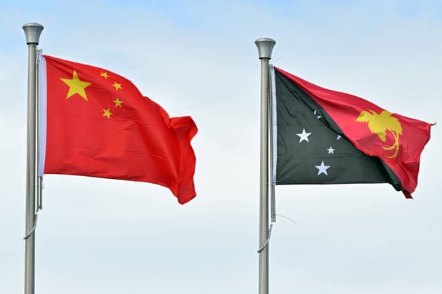 ANTHONY ALBANESE PACIFIC ISLANDS VISIT, China™s flag flag is seen with Papua New Guinea™s flag during Independence Day celebrations at National Stadium in Honiara, Solomon Islands, Tuesday, July 7, 2026. ( NO ARCHIVING HONIARA SOLOMON ISLANDS  Copyright: xMICKxTSIKASx 20260707133379990124