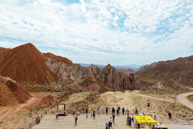 ZHANGYE, CHINA - JULY 06: Tourists visit Alien Valley Geopark on July 6, 2026 in Sunan Yugur Autonomous County, Zhangye City, Gansu Province of China. The scenic area features natural landscapes that resemble the surface of an alien planet.  Copyright: xChinaxNewsxServicex 111652657478