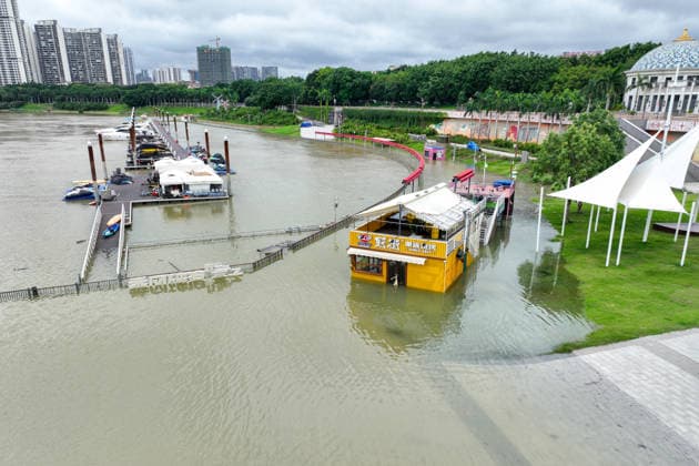 NANNING, CHINA - JULY 06: Aerial view of shops submerged in flood water on July 6, 2026 in Nanning, Guangxi Zhuang Autonomous Region of China. Local authorities launched a Level-IV flood emergency response as the river exceeded warning levels following heavy rainfall brought by typhoon Maysak.  Copyright: xChinaxNewsxServicex 111652649511