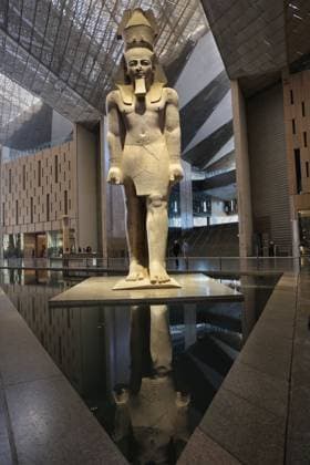 People walk past a statue of King Ramses II at the entrance of the Grand Egyptian Museum (GEM), in Giza, Egypt Cairo, Egypt July 6, 2026: The colossal statue of King Ramesses II dominates the Grand Hall of the Grand Egyptian Museum (GEM), welcoming visitors at the museum s main entrance. Standing approximately 11 meters tall and weighing around 83 tons, the red granite masterpiece dates back more than 3,200 years to Egypt s 19th Dynasty. Originally discovered in the ancient city of Memphis, the statue symbolizes the power and legacy of one of ancient Egypt s greatest pharaohs. Today, it serves as one of the Grand Egyptian Museum s most iconic landmarks, reflecting the grandeur of Egypt s rich archaeological Mahmoud Ghany Giza Egypt Copyright: x xMahmoudxAhmedxabdxelghanyx xJNAxPressx