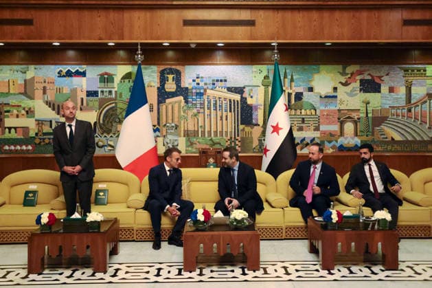 President Macron Arrives For A State Visit To Damascus France s President Emmanuel Macron (2nd L) speaks with Syria s Foreign Minister Asaad al-Shaibani (C-R) next to France s Foreign Affairs Minister Jean-Noel Barrot (L) during a bilateral meeting at the Damascus International Airport in Damascus on July 6, 2026. French President Emmanuel Macron arrived in Damascus on July 6, 2026 for the first visit by a Western European head of state since Syria s new authorities took power in 2024, an AFP journalist said. Macron, who will depart on July 7, 2026, will advocate for a free, pluralist Syria that respects each of its components and plays a role in moderating Middle East tensions, the French presidency told journalists ahead of his arrival.  Copyright: xMarinxLudovic Pool ABACAx