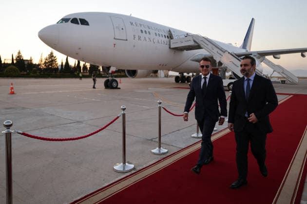 President Macron Arrives For A State Visit To Damascus France s President Emmanuel Macron (L) is welcomed by Syria s Foreign Minister Asaad al-Shaibani (R) as he arrives fo a state visit at the Damascus International Airport in Damascus on July 6, 2026. French President Emmanuel Macron arrived in Damascus on July 6, 2026 for the first visit by a Western European head of state since Syria s new authorities took power in 2024, an AFP journalist said. Macron, who will depart on July 7, 2026, will advocate for a free, pluralist Syria that respects each of its components and plays a role in moderating Middle East tensions, the French presidency told journalists ahead of his arrival. Photo by Ludovic Marin Pool ABACAPRESS.COM Damascus Syria  Copyright: xMarinxLudovic Pool ABACAx