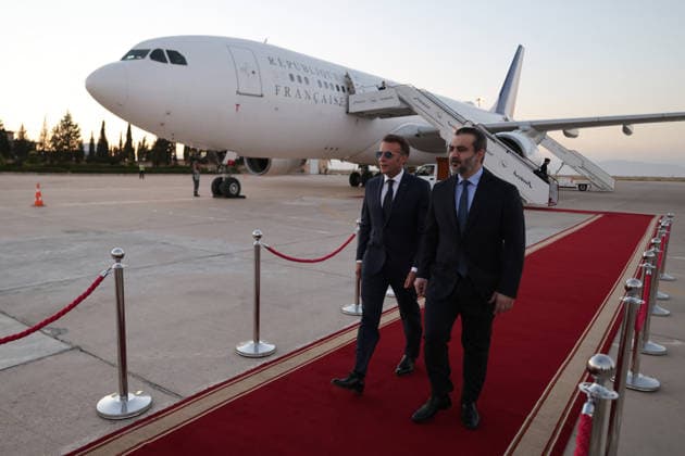 President Macron Arrives For A State Visit To Damascus France s President Emmanuel Macron (L) is welcomed by Syria s Foreign Minister Asaad al-Shaibani (R) as he arrives fo a state visit at the Damascus International Airport in Damascus on July 6, 2026. French President Emmanuel Macron arrived in Damascus on July 6, 2026 for the first visit by a Western European head of state since Syria s new authorities took power in 2024, an AFP journalist said. Macron, who will depart on July 7, 2026, will advocate for a free, pluralist Syria that respects each of its components and plays a role in moderating Middle East tensions, the French presidency told journalists ahead of his arrival. Photo by Ludovic Marin Pool ABACAPRESS.COM Damascus Syria  Copyright: xMarinxLudovic Pool ABACAx