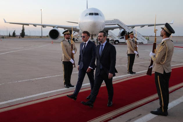 President Macron Arrives For A State Visit To Damascus France s President Emmanuel Macron (L) is welcomed by Syria s Foreign Minister Asaad al-Shaibani (R) as he arrives fo a state visit at the Damascus International Airport in Damascus on July 6, 2026. French President Emmanuel Macron arrived in Damascus on July 6, 2026 for the first visit by a Western European head of state since Syria s new authorities took power in 2024, an AFP journalist said. Macron, who will depart on July 7, 2026, will advocate for a free, pluralist Syria that respects each of its components and plays a role in moderating Middle East tensions, the French presidency told journalists ahead of his arrival. Photo by Ludovic Marin Pool ABACAPRESS.COM Damascus Syria  Copyright: xMarinxLudovic Pool ABACAx