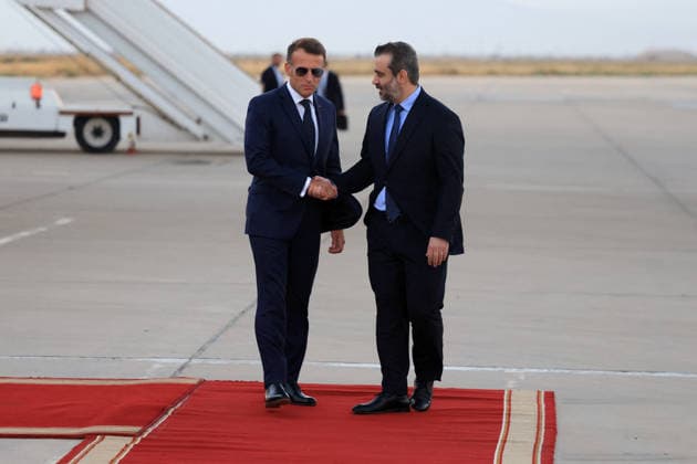 President Macron Arrives For A State Visit To Damascus France s President Emmanuel Macron (L) is welcomed by Syria s Foreign Minister Asaad al-Shaibani (R) as he arrives for a state visit at the Damascus International Airport in Damascus on July 6, 2026. French President Emmanuel Macron arrived in Damascus on July 6, 2026 for the first visit by a Western European head of state since Syria s new authorities took power in 2024, an AFP journalist said. Macron, who will depart on July 7, 2026, will advocate for a free, pluralist Syria that respects each of its components and plays a role in moderating Middle East tensions, the French presidency told journalists ahead of his arrival. Photo by Ludovic Marin Pool ABACAPRESS.COM Damascus Syria  Copyright: xMarinxLudovic Pool ABACAx