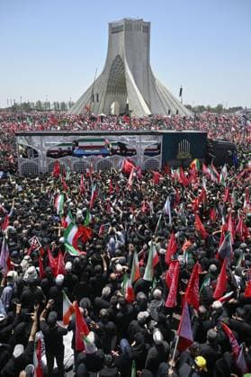 Funeral for Iran s ex-leader Khamenei A truck carrying late Iranian Supreme Leader Ayatollah Ali Khamenei s coffin crawls through crowds in a funeral procession in Tehran, Iran, on July 6, 2026, following his death in Israeli and U.S. airstrikes in February.  A14AA0005621971P