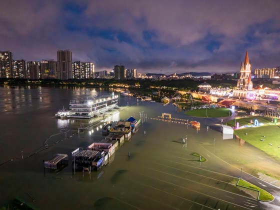 China Guangxi Flooding A riverside park is seen inundated by the surging flood brought by Typhoon Maysak in Nanning, Guangxi Zhuang Autonomous Region, southern China, on Monday, July 6, 2026., Credit:HU YAN Utuku Feature China Avalon CHINA, GUANGXI, NANNING  Copyright: xHUxYANx xUtuku FeaturexChinax xAvalonx 1114881624