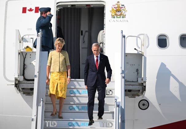NATO Heads of State and Government Summit in Ankara ANKARA, TURKIYE - JULY 07: Canadian Prime Minister Mark Carney (R) and his wife, Diana Fox Carney (L), arrive at Ankara Airport to attend the 36th NATO Heads of State and Government Summit in Ankara, Turkiye, on July 07, 2026. Muhammed Abdullah Kurtar Anadolu Ankara Turkey. Editorial use only. Please get in touch for any other usage.  Copyright: x2026xAnadoluxMuhammedxAbdullahxKurtarx