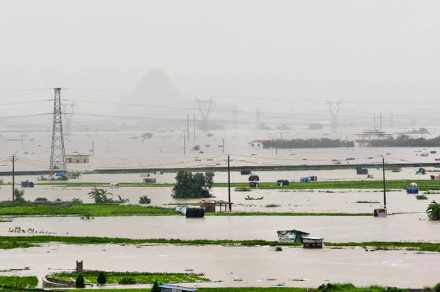 NANNING, CHINA - JULY 07: Floodwaters submerge villages and farmlands with only the tops of jasmine planting sheds visible after typhoon Maysak on July 7, 2026 in Hengzhou, Nanning, Guangxi Zhuang Autonomous Region of China. Local authorities are organizing the evacuation of residents in affected areas of Hengzhou City in Guangxi.  Copyright: xVCGx 111652794684