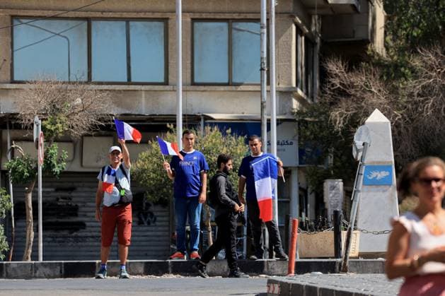 Atmosphere During President Macron State Visit To Damascus Bystanders wave French national flag in front of France s President s hotel during his visit in Damascus on July 7, 2026. Syria s President Ahmed al-Sharaa hailed France s constructive role in the transition since the toppling of longtime ruler Bashar al-Assad, as French leader Emmanuel Macron made the first post-conflict visit to Damascus by a Western European leader. (hoto by Ludovic Marin Pool ABACAPRESS.COM Damascus Syria  Copyright: xMarinxLudovic Pool ABACAx