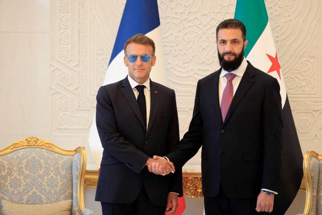 President Macron with President al-Sharaa Meeting - Damascus France s President Emmanuel Macron (L) shakes hands with Syrian President Ahmed al-Sharaa ahead of their meeting at the People s Palace in Damascus on July 7, 2026. French President Emmanuel Macron arrived in Damascus on July 6, 2026 for the first visit by a Western European head of state since Syria s new authorities took power in 2024, an AFP journalist said. Macron, who will depart on July 7, 2026, will advocate for a free, pluralist Syria that respects each of its components and plays a role in moderating Middle East tensions, the French presidency told journalists ahead of his arrival. (hoto by Ludovic Marin Pool ABACAPRESS.COM Damascus Syria  Copyright: xMarinxLudovic Pool ABACAx