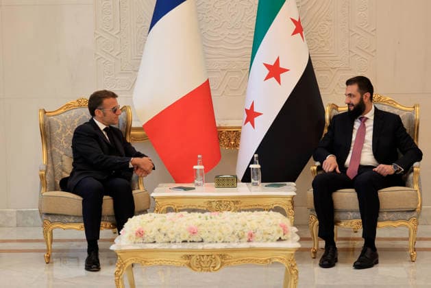President Macron with President al-Sharaa Meeting - Damascus France s President Emmanuel Macron (L) and Syria s President Ahmed al-Sharaa attend a meeting at the People s Palace in Damascus on July 7, 2026. Syria s President Ahmed al-Sharaa hailed France s constructive role in the transition since the toppling of longtime ruler Bashar al-Assad, as French leader Emmanuel Macron made the first post-conflict visit to Damascus by a Western European leader. (hoto by Ludovic Marin Pool ABACAPRESS.COM Damascus Syria  Copyright: xMarinxLudovic Pool ABACAx