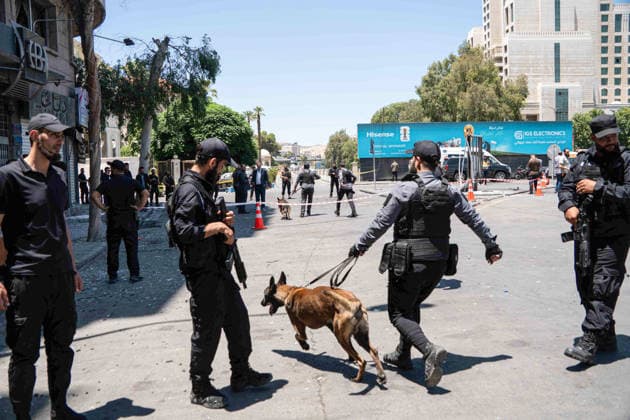 Eighteen injured in double explosions near Tourism Ministry in Syrian capital Damascus DAMASCUS, SYRIA - JULY 7: Security forces take strict security measures following two consecutive explosions that occurred near the Ministry of Tourism building, injuring 18 people including four security personnel, in Damascus, Syria on July 7, 2026. The area was cordoned off as emergency teams and security units responded to the aftermath of the twin blasts in the capital. Anagha Subhash Nair Anadolu Damascus Syria. Editorial use only. Please get in touch for any other usage.  Copyright: x2026xAnadoluxAnaghaxSubhashxNairx