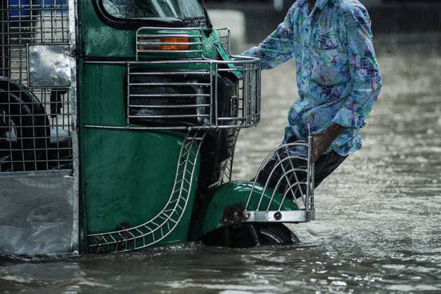 July 7, 2026: Chattogram, Bangladesh - A Cng strucked in a waterlogged street in the Bahaddarhat area of Chattogram on Tuesday, continuing three consecutive days of heavy rainfall. The persistent downpours triggered severe waterlogging across several parts of the port city, submerging roads, disrupting traffic, and causing widespread inconvenience to residents. - ZUMAr143 20260707_zap_r143_012 Copyright: xMdxRafayatxHaquexKhanx