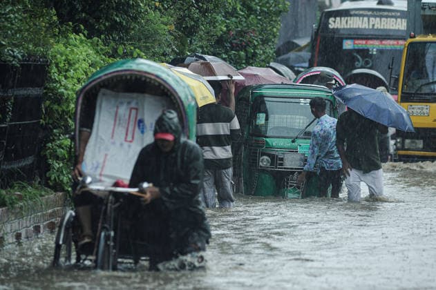 July 7, 2026: Chattogram, Bangladesh - A Cng strucked in a waterlogged street in the Bahaddarhat area of Chattogram on Tuesday, continuing three consecutive days of heavy rainfall. The persistent downpours triggered severe waterlogging across several parts of the port city, submerging roads, disrupting traffic, and causing widespread inconvenience to residents. - ZUMAr143 20260707_zap_r143_015 Copyright: xMdxRafayatxHaquexKhanx