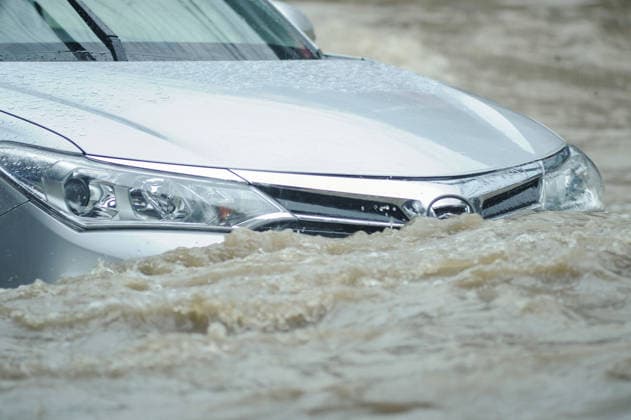 July 7, 2026: Chattogram, Bangladesh - A car navigate a waterlogged street in the Bahaddarhat area of Chattogram on Tuesday, continuing three consecutive days of heavy rainfall. The persistent downpours triggered severe waterlogging across several parts of the port city, submerging roads, disrupting traffic, and causing widespread inconvenience to residents. - ZUMAr143 20260707_zap_r143_018 Copyright: xMdxRafayatxHaquexKhanx