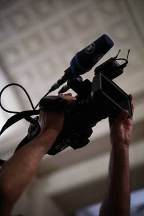 Decision on Appeal Trial of Marine Le Pen and Rn S Officials on Suspicion of Embezzlement of European Public Funds - Paris Journalist and cameraman at Paris courthouse before the decision on the appeal trial of President of the parliamentary group of the French far-right Rassemblement National (RN) party, Marine Le Pen and officials of French far-right Rassemblement National (RN) party on suspicion of embezzlement of European public funds, in Paris on July 7, 2026. The appeal comes after a court last year barred Le Pen from running for office for five years over a European Parliament fake-jobs scam involving her and other officials from her National Rally party. Photo by Raphael Lafargue ABACAPRESS.COM Paris Ile-de-France France  Copyright: xLafarguexRaphael ABACAx