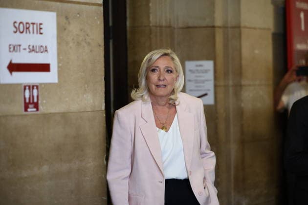 Marine Le Pen Appeal Trial Decision - Paris Marine Le Pen arriving at Paris courthouse before the decision on the appeal trial of President of the parliamentary group of the French far-right Rassemblement National (RN) party, Marine Le Pen and officials of French far-right Rassemblement National (RN) party on suspicion of embezzlement of European public funds, in Paris on July 7, 2026. The appeal comes after a court last year barred Le Pen from running for office for five years over a European Parliament fake-jobs scam involving her and other officials from her National Rally party. Photo by Raphael Lagargue ABACAPRESS.COM Paris France  Copyright: xLafarguexRaphael ABACAx