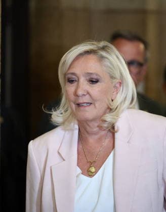 Marine Le Pen Appeal Trial Decision - Paris Marine Le Pen arriving at Paris courthouse before the decision on the appeal trial of President of the parliamentary group of the French far-right Rassemblement National (RN) party, Marine Le Pen and officials of French far-right Rassemblement National (RN) party on suspicion of embezzlement of European public funds, in Paris on July 7, 2026. The appeal comes after a court last year barred Le Pen from running for office for five years over a European Parliament fake-jobs scam involving her and other officials from her National Rally party. Photo by Raphael Lagargue ABACAPRESS.COM Paris France  Copyright: xLafarguexRaphael ABACAx