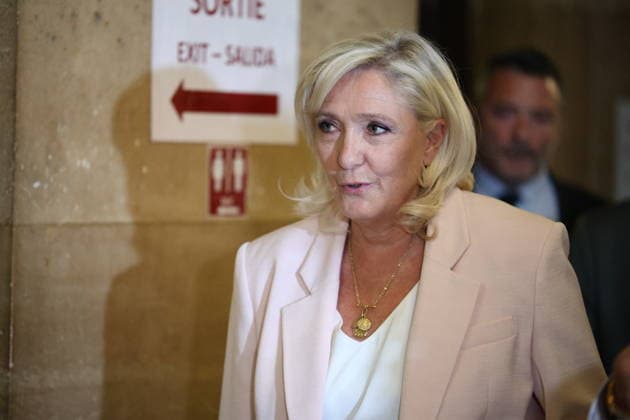 Marine Le Pen Appeal Trial Decision - Paris Marine Le Pen arriving at Paris courthouse before the decision on the appeal trial of President of the parliamentary group of the French far-right Rassemblement National (RN) party, Marine Le Pen and officials of French far-right Rassemblement National (RN) party on suspicion of embezzlement of European public funds, in Paris on July 7, 2026. The appeal comes after a court last year barred Le Pen from running for office for five years over a European Parliament fake-jobs scam involving her and other officials from her National Rally party. Photo by Raphael Lagargue ABACAPRESS.COM Paris France  Copyright: xLafarguexRaphael ABACAx